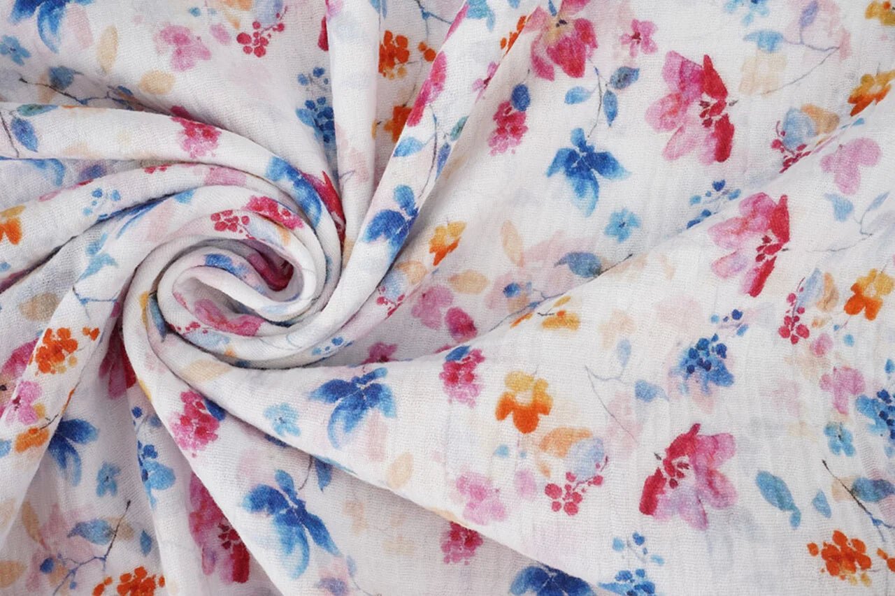 Muslin with blue and pink flowers – available online at Charlotte's Fabrics