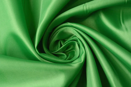 Image with lining fabric - apple green 55 g/m² – available at Charlotte's Fabrics