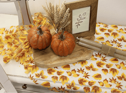Image of organza fabric with a shimmering autumn leaf pattern – available online at Charlotte's Fabrics