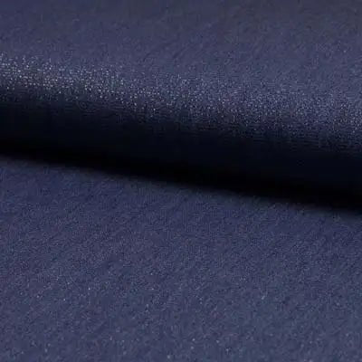 Image of thin denim fabric for dresses and shirts—indigo blue with a metallic sheen, available online at Charlotte Fabrics