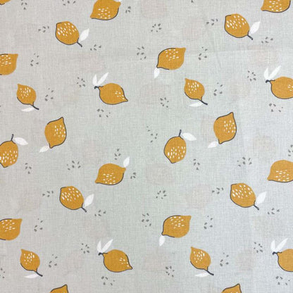 Premium 100% bawełniana tkanina - cytryny na jasnoszarym tle 115 g/m²
