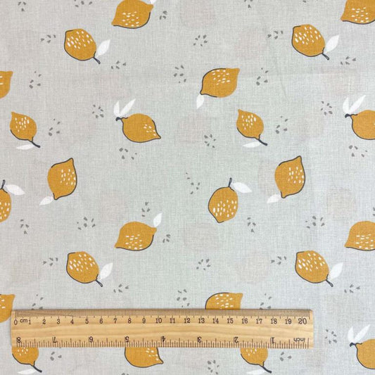 Premium 100% bawełniana tkanina - cytryny na jasnoszarym tle 115 g/m²