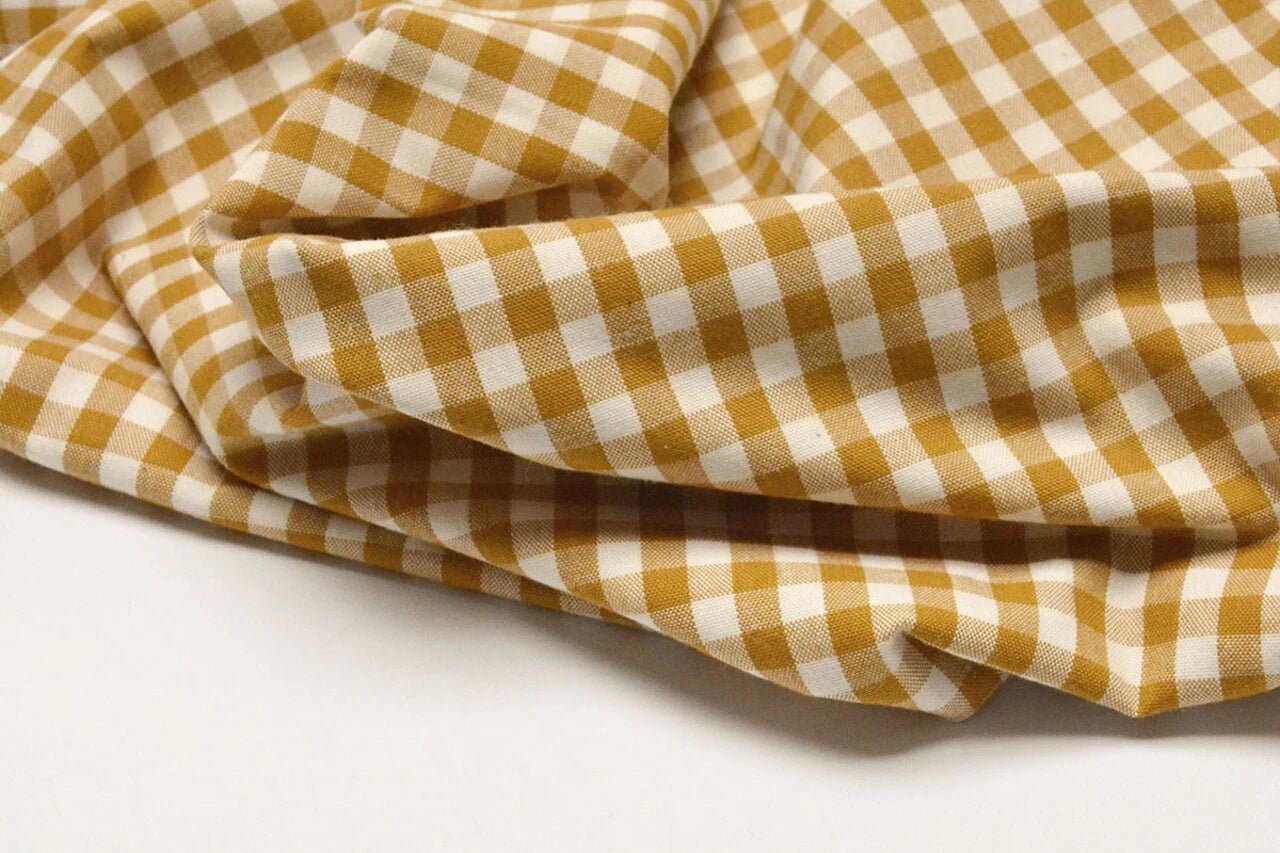 Attēls ar premium cotton fabric-mustard yellow checked – available online at Šarlotes audumi