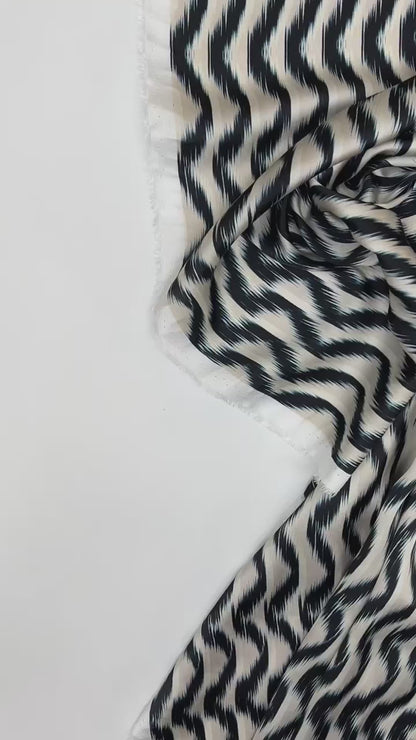 Italian satin fabric, beige and blue, with abstract pattern 85 g/m2