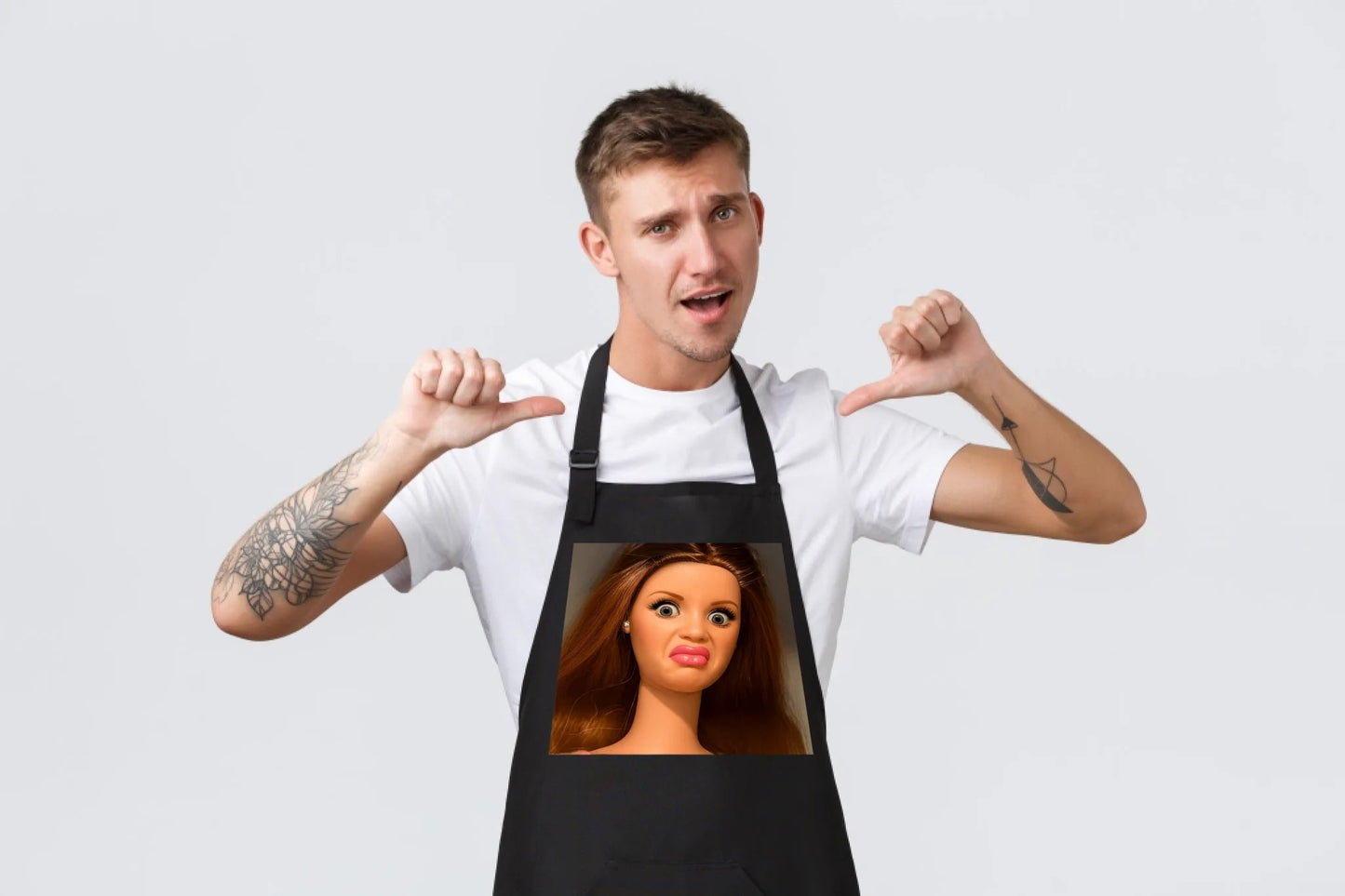 Image of a black printed apron – available at Charlotte's Fabrics