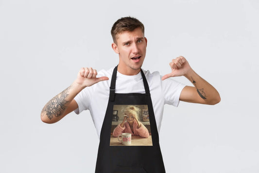 Image of black "GTFO" apron – available at Šarlotes audumi