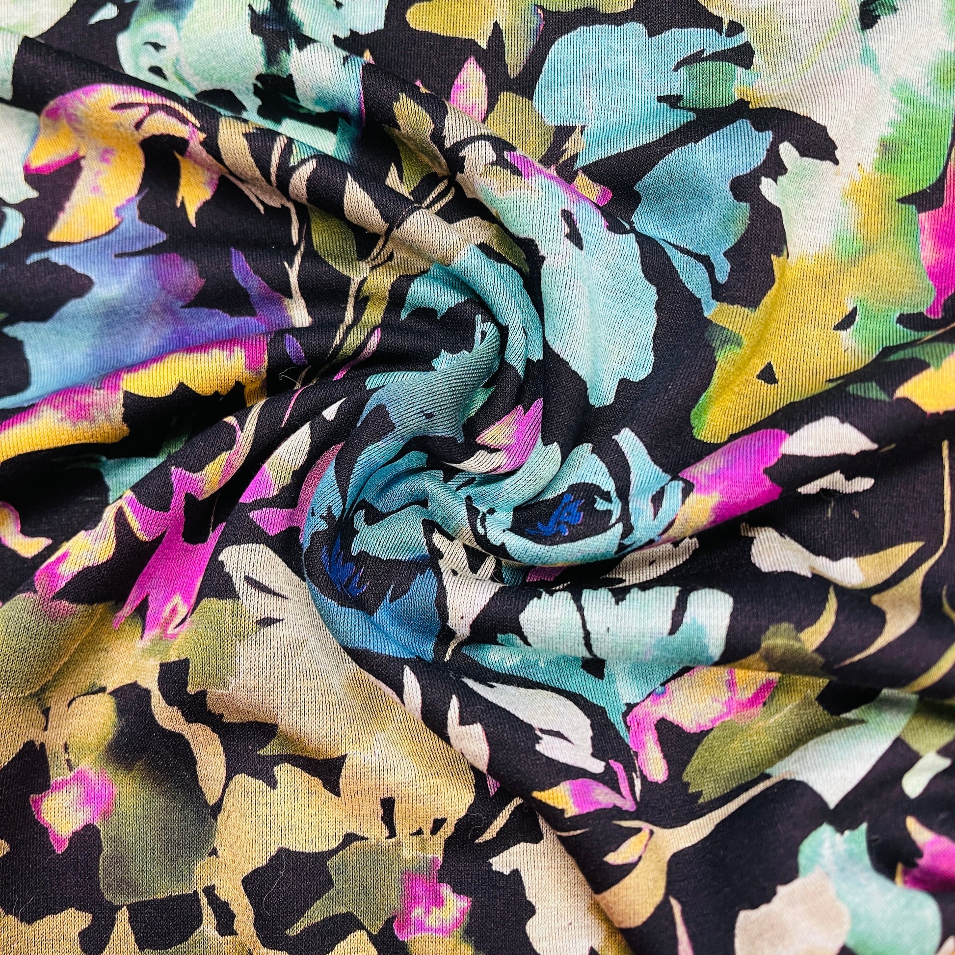 Image of Punto di Roma knit fabric - flowers on a black background 240 g/m² – available at Šarlotes audumi