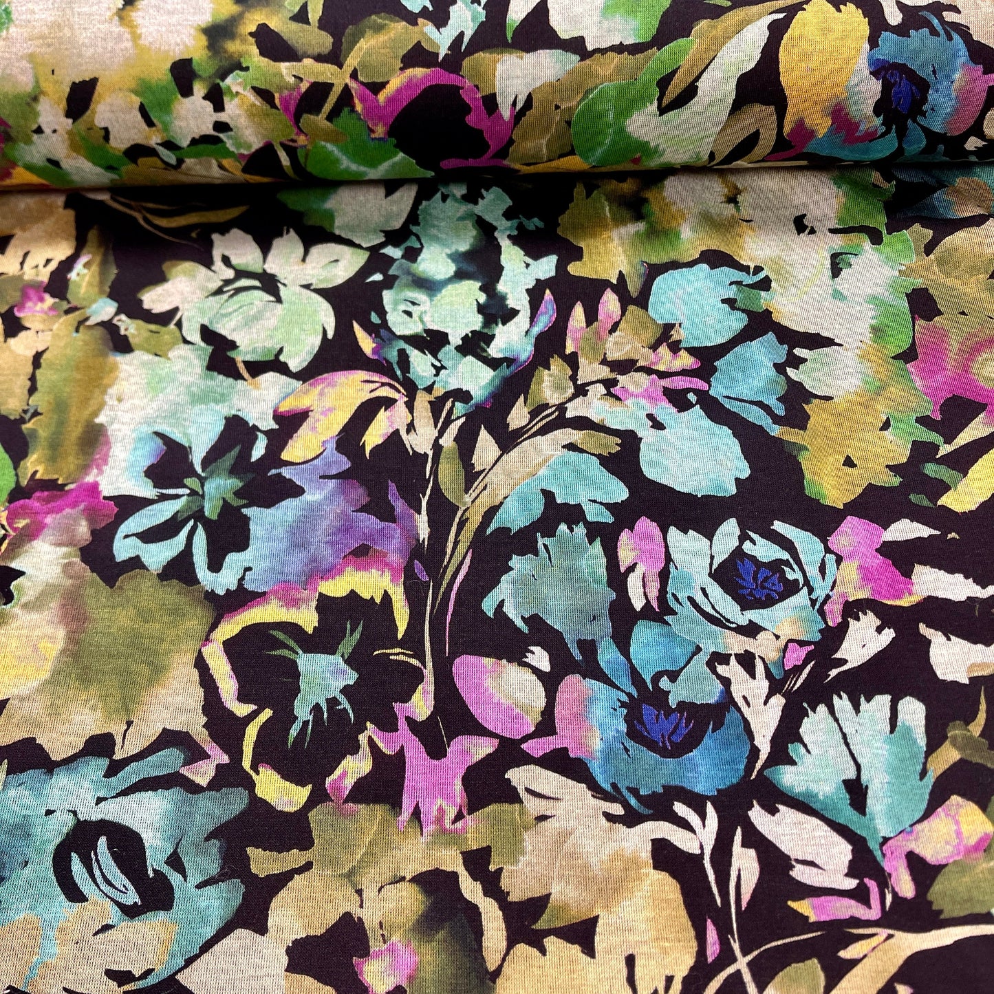 Image of Punto di Roma knit fabric - flowers on a black background 240 g/m² – available at Šarlotes audumi