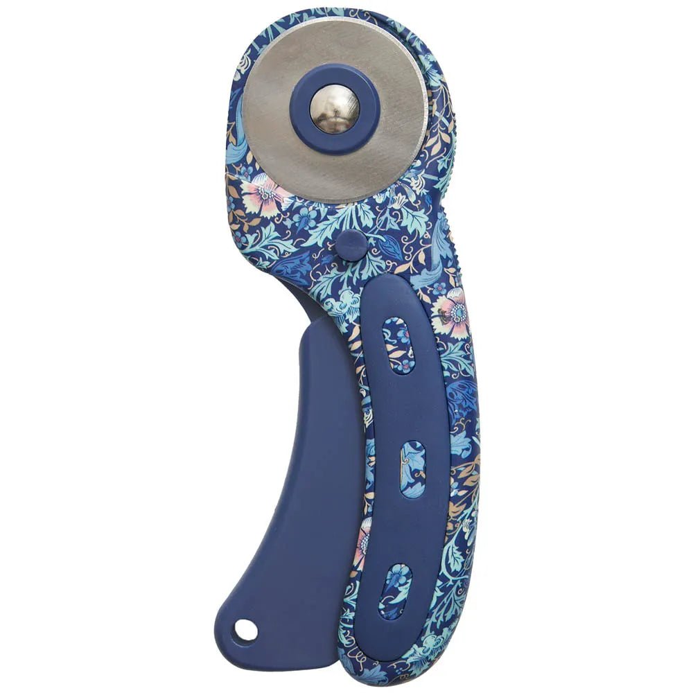Image with 45 mm rotary cutter with floral pattern by Hobby Gift – available at Charlotte’s Fabrics