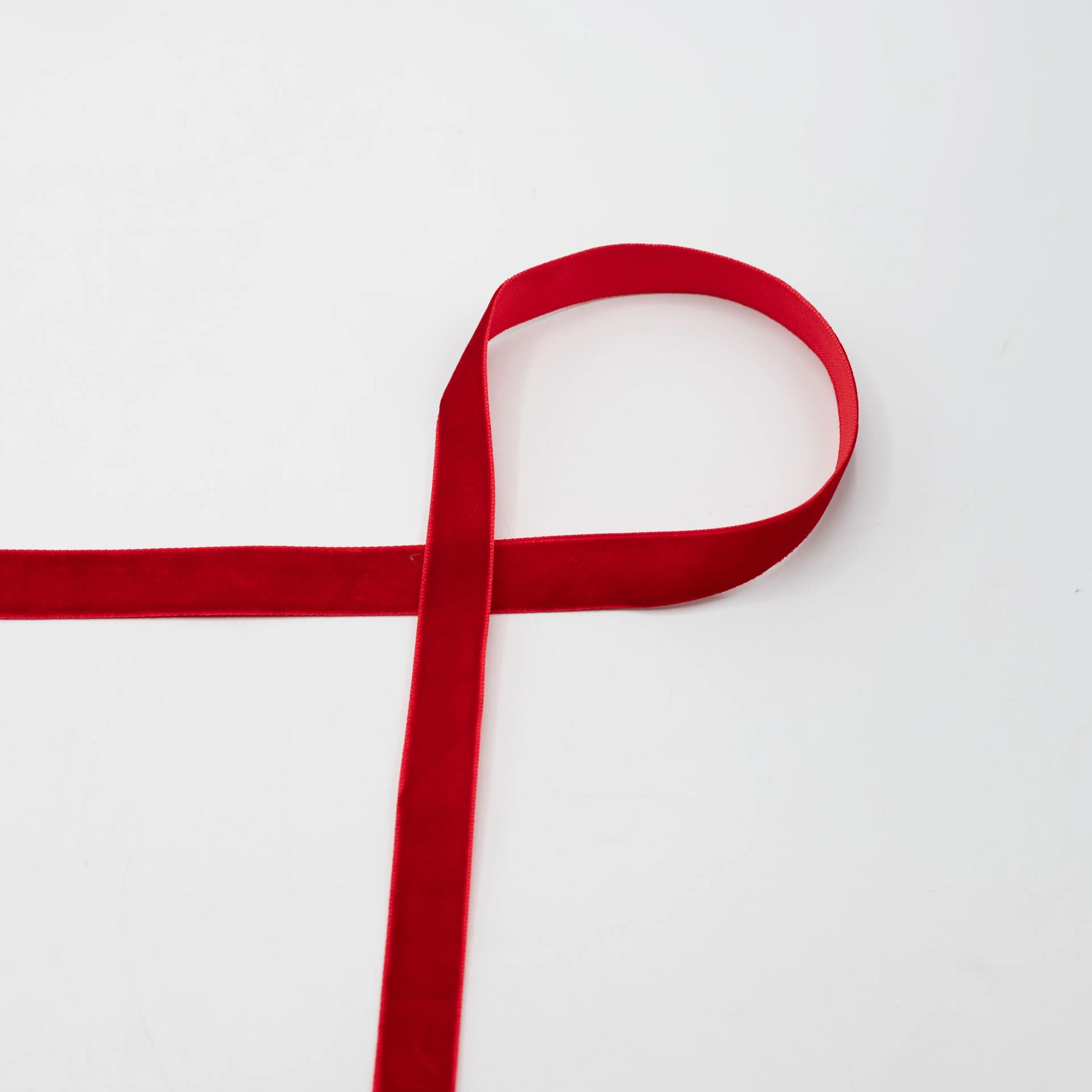 Image of Velvet ribbon 15 mm - red – available at Charlotte's Fabrics