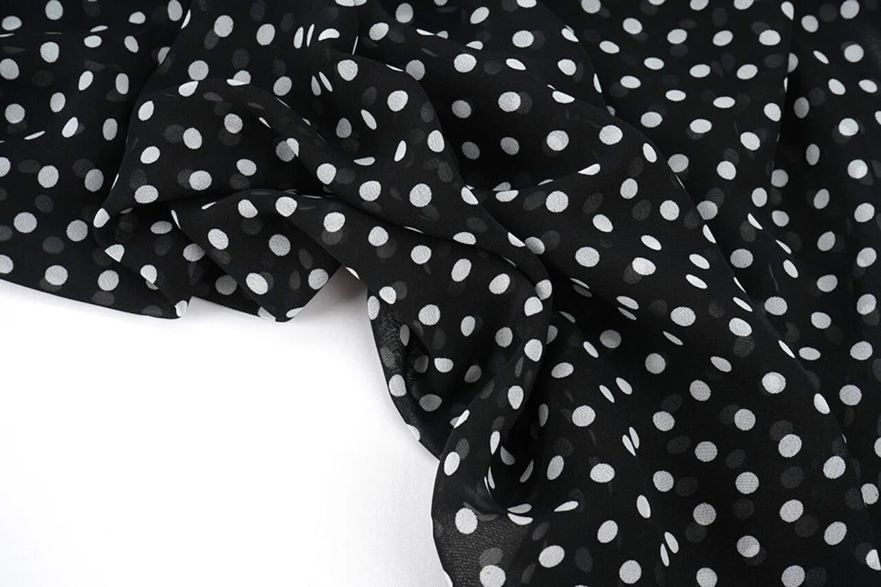 Chiffon - white polka dots on a black background | 150 cm | 65 g/m²