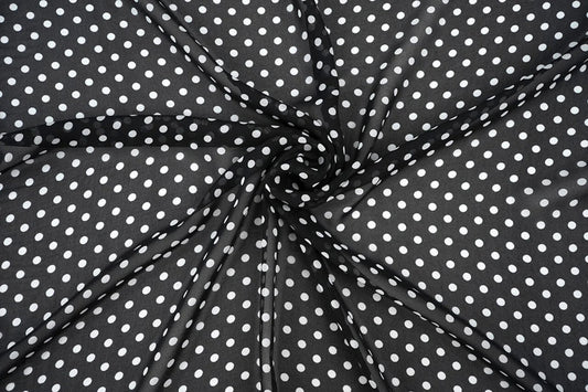 Chiffon - white polka dots on a black background | 150 cm | 65 g/m²