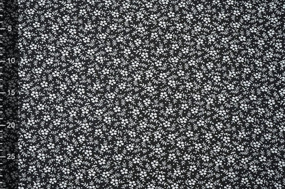 Chiffon - white flowers on a black background | 150 cm | 65 g/m²