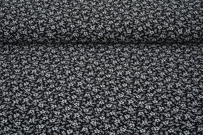 Chiffon - white flowers on a black background | 150 cm | 65 g/m²