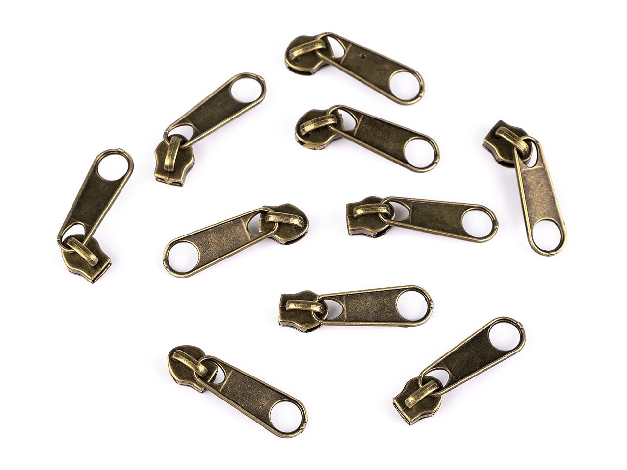 alt
Image with slider, slider pull for spiral zipper No. 3|various shades – available at Charlotte's fabrics