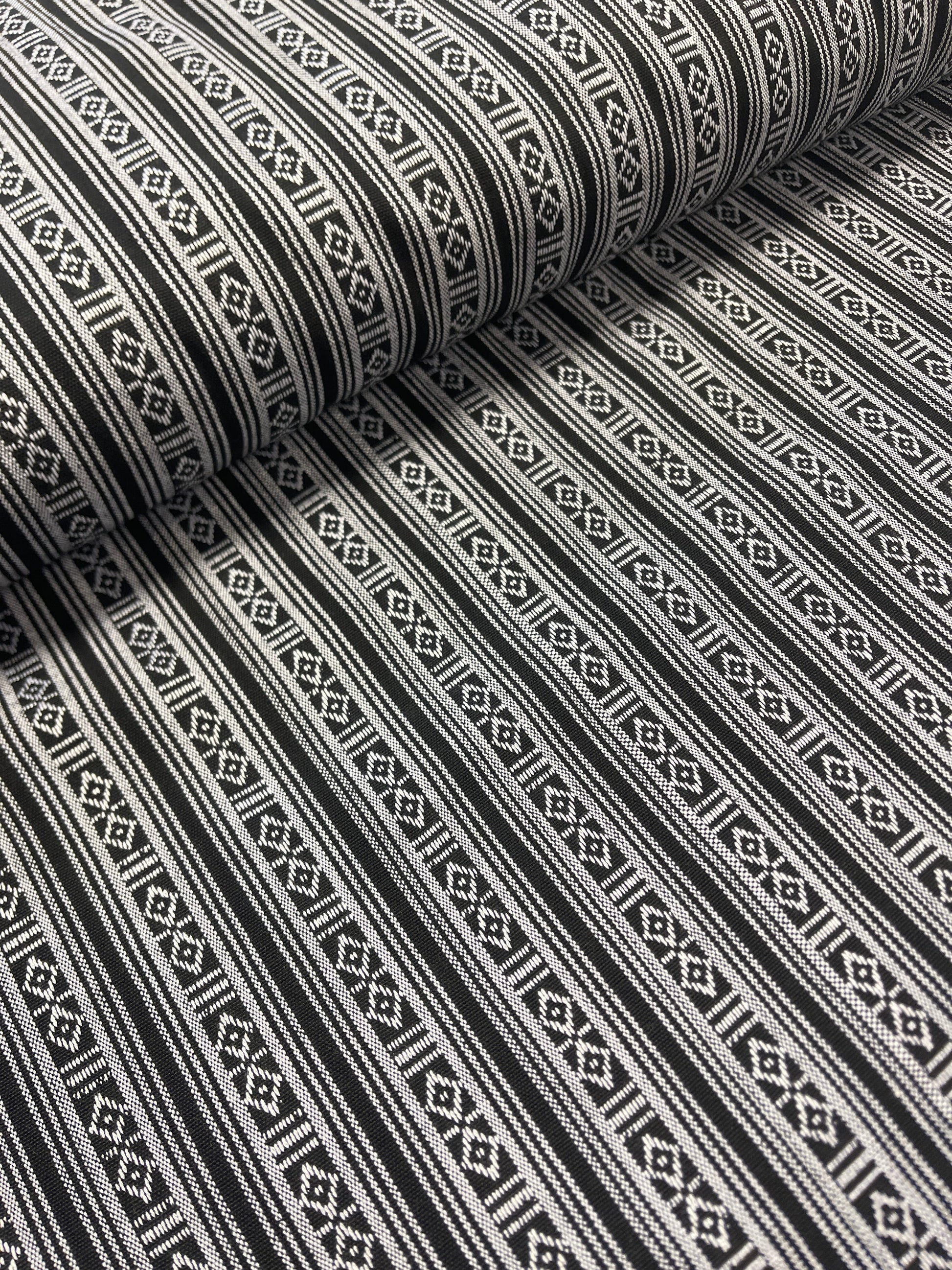 Fabric with a traditional pattern - black with white 200 g/m² – available at Šarlotes audumi
