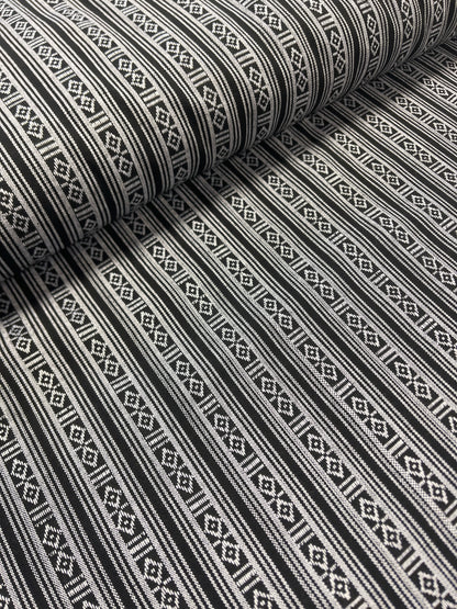 Fabric with a traditional pattern - black with white 200 g/m² – available at Šarlotes audumi
