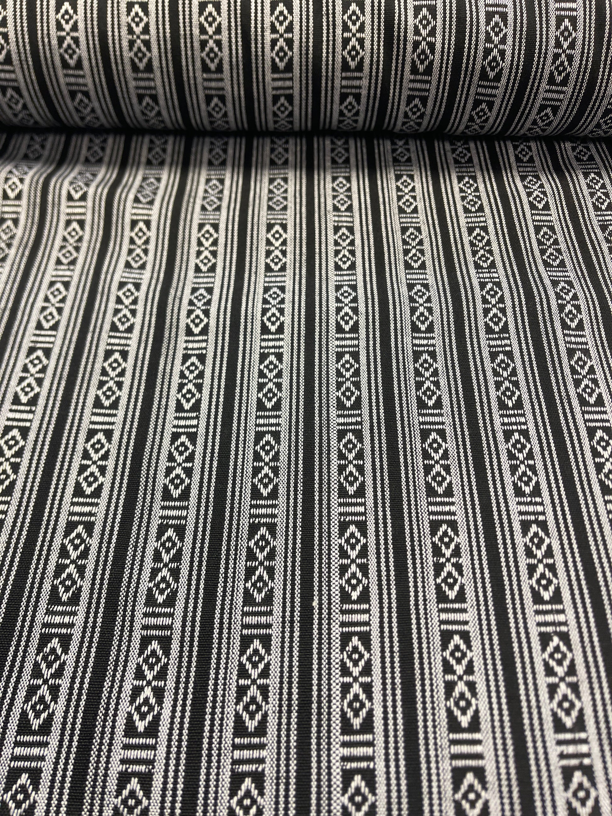 Fabric with a traditional pattern - black with white 200 g/m² – available at Šarlotes audumi
