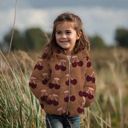 Image with Teddy fleece cherries – available online at Charlotte’s Fabrics