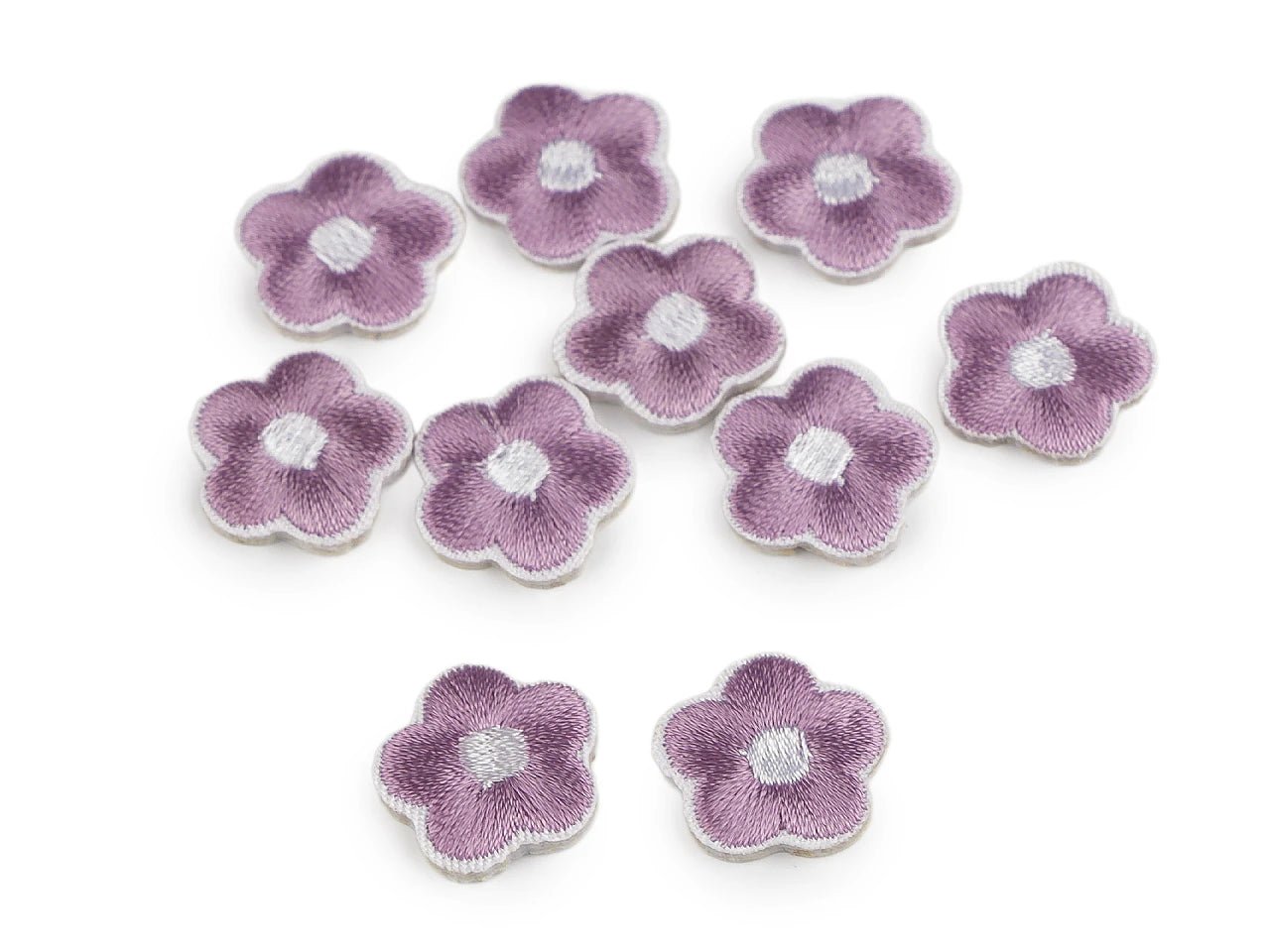 Image of an iron-on flower patch applique available at Charlotte's Fabrics