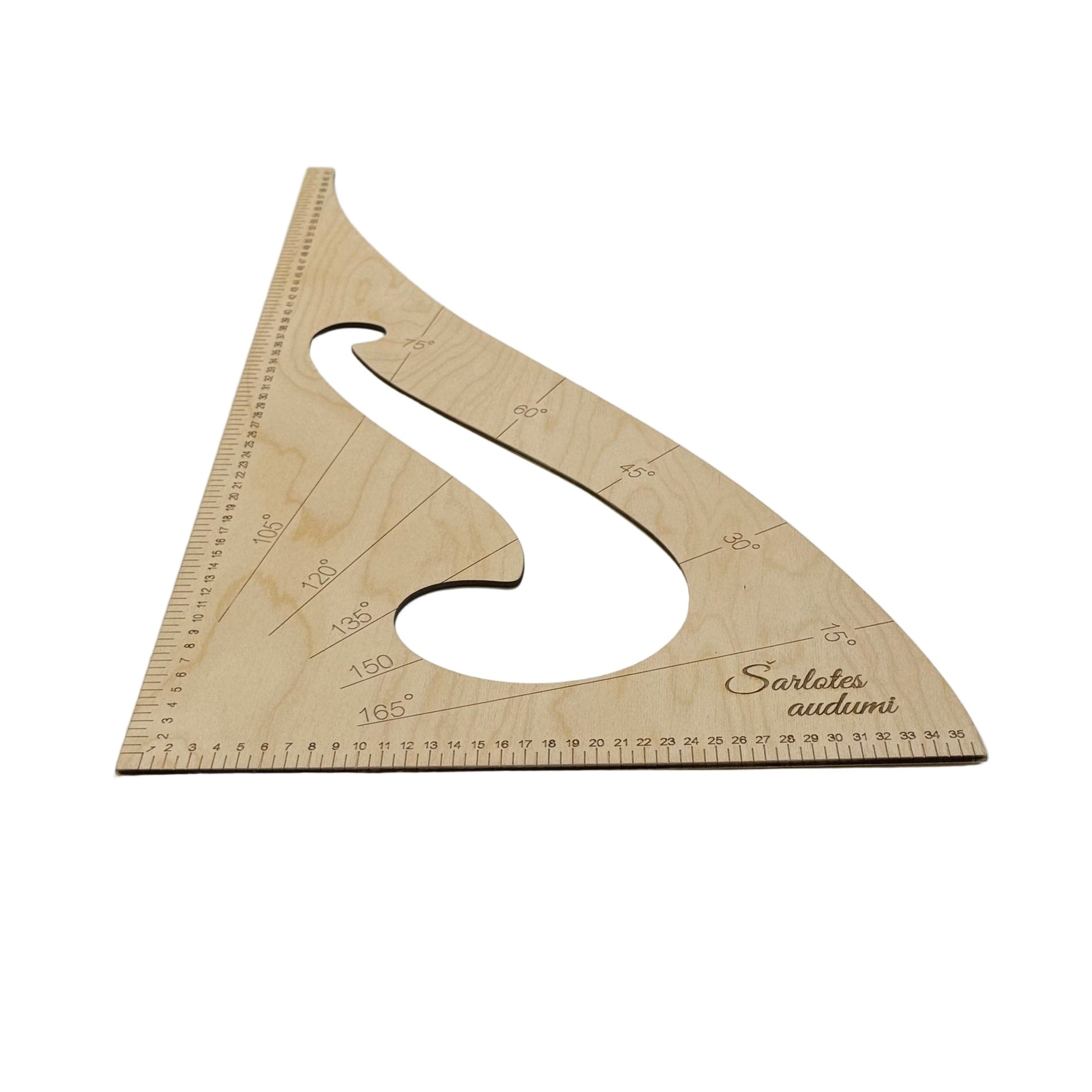 alt
Image of a triangular ruler with a template – available at Šarlotes audumi