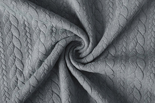 Image with knitted fabric with a knit pattern - gray braids 340 g/m² – available at Charlotte Fabrics