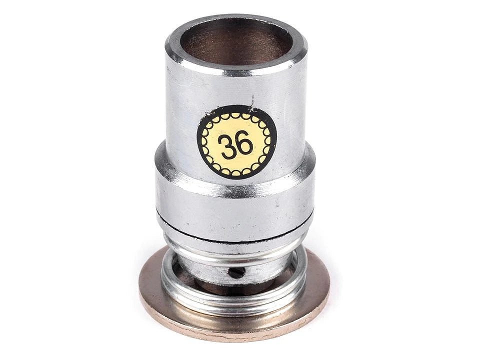 alt
Image of a mold for making fabric buttons in a hand press – available at Šarlotes audumi