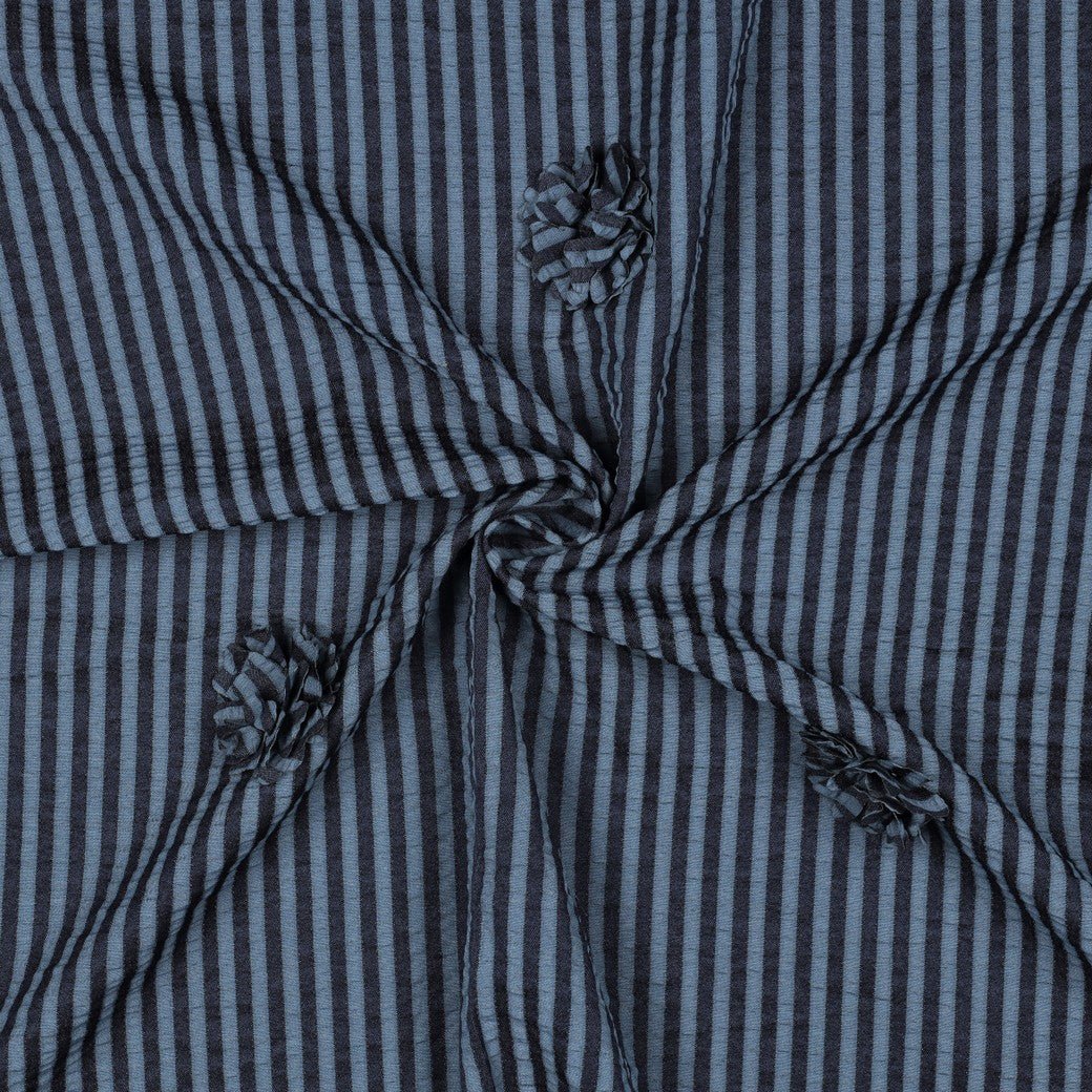 Image of viscose fabric with stripes and a floral motif – dark blue 130 g/m² – available at Šarlotes audumi
