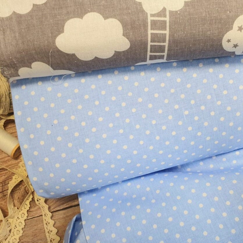 100% Cotton fabric-white dots on a blue background (4 mm) 130 g/m²