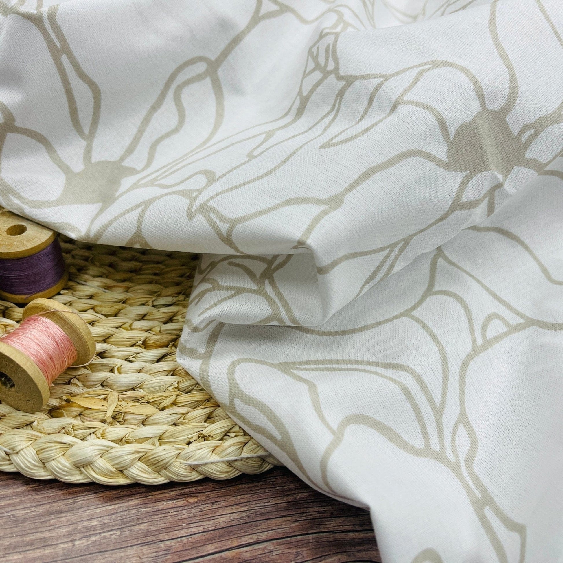 100% Cotton fabric - beige floral pattern on a white background 130 g/m²