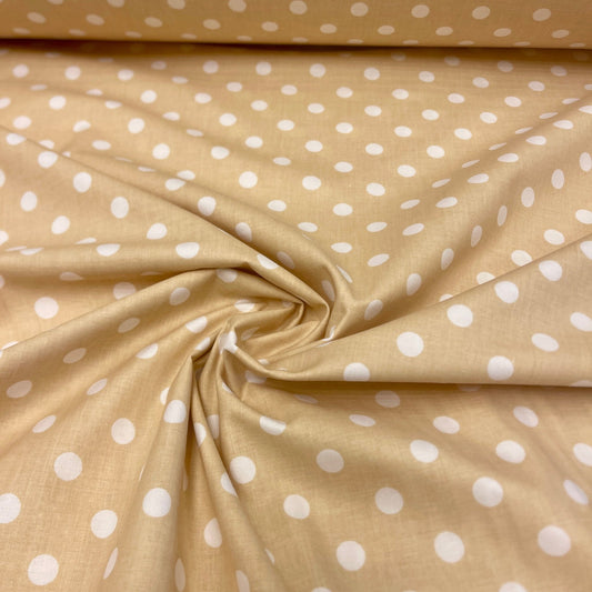 100% Cotton fabric with dots on a soft yellow background 125 g/m²