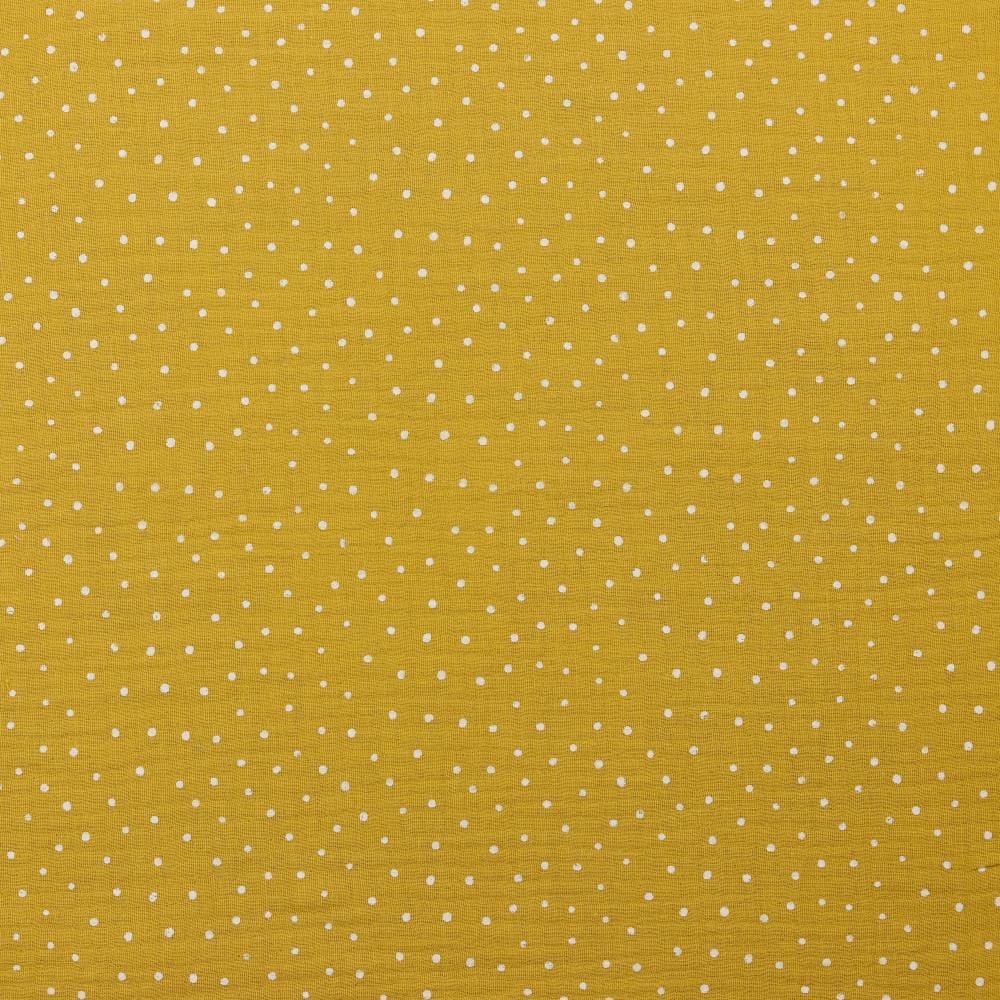 Muslin polka dots on a honey-yellow background 130 g/m²