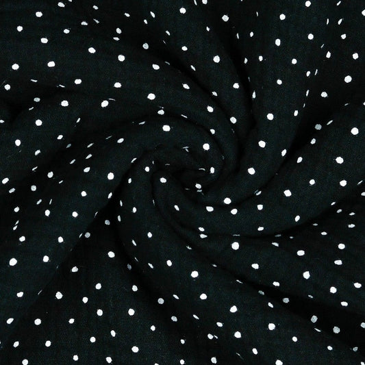 Muslin polka dots on a black background 125 g/m²