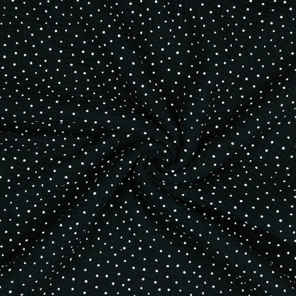 Muslin polka dots on a black background 125 g/m²