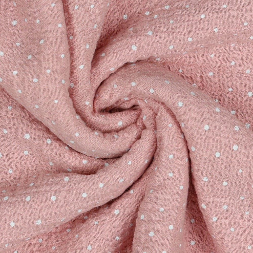 Muslin polka dots on a pink background 125 g/m²