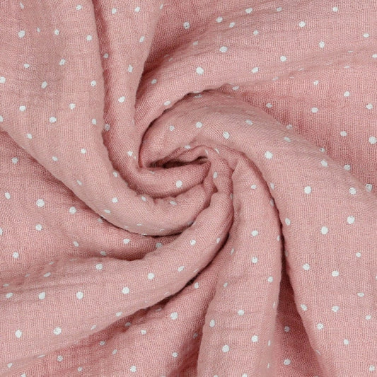 Muslin polka dots on a pink background 125 g/m²