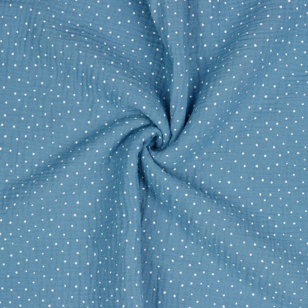 Polka dot muslin on a blue background 125 g/m²