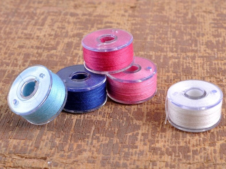 Plastic bobbin for Singer sewing machines Ø 19.4 mm