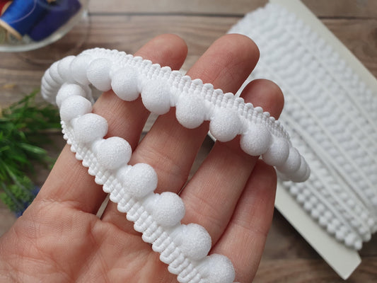 alt
Pom pom ribbon-12 mm white
