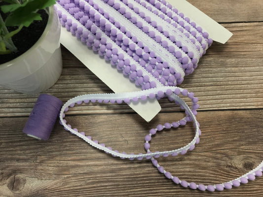 alt
Pom Pom ribbon - 12 mm lilac/white