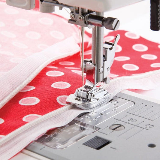 Invisible zipper foot for sewing machine