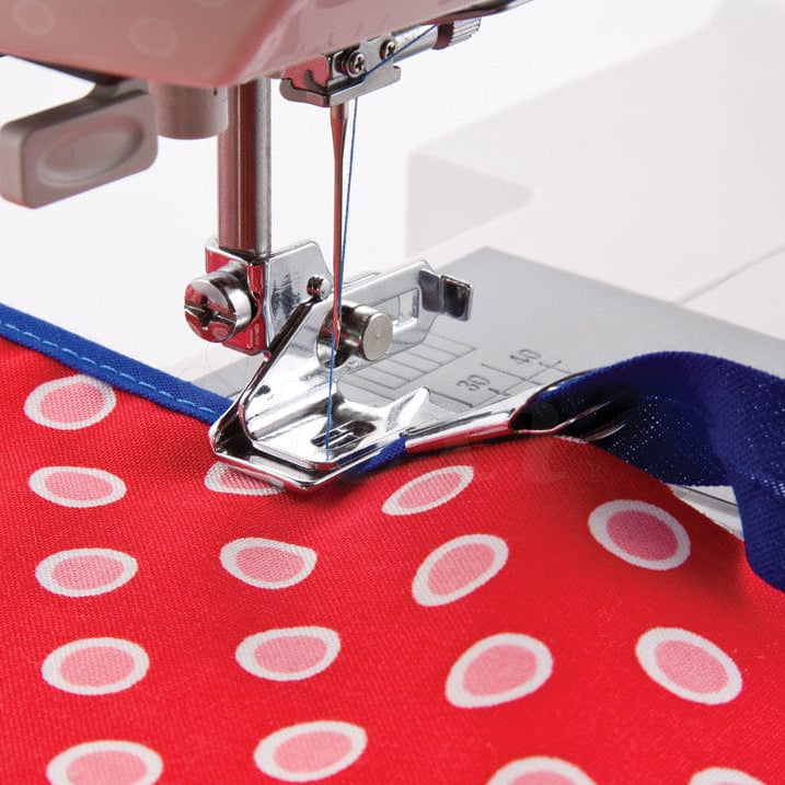 Sewing machine foot for attaching bias tape