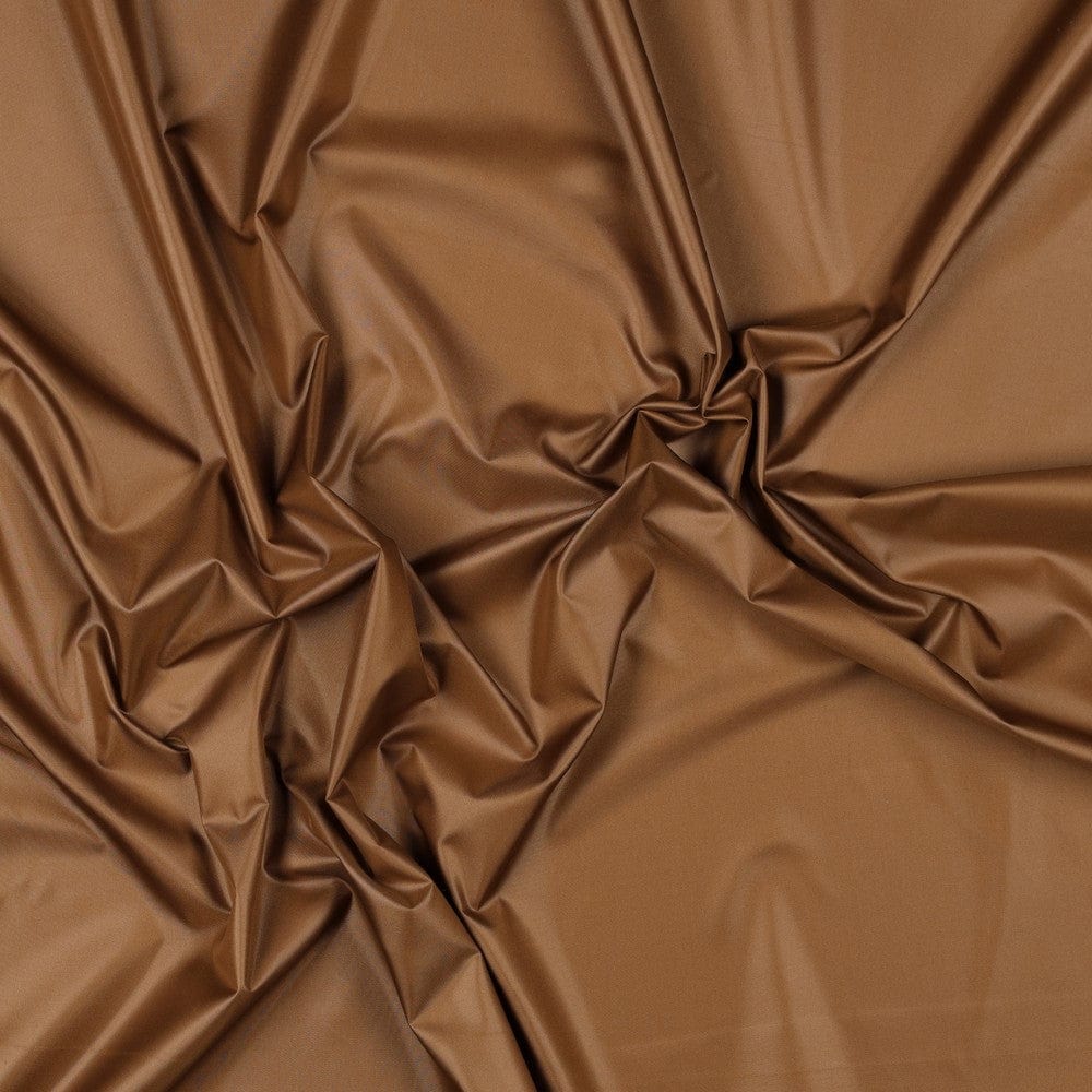 alt
Waterproof raincoat fabric-nut brown 70 g/m²